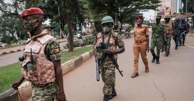 Security forces officers are seen during a joint patrol in a street ahead of Uganda's election results announcement in Kampala, Uganda, Jan. 16, 2021. (AFP Photo)
