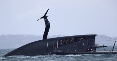 View of the capsized American Magic in Auckland, New Zealand, Jan. 17, 2021. (AFP PHOTO)