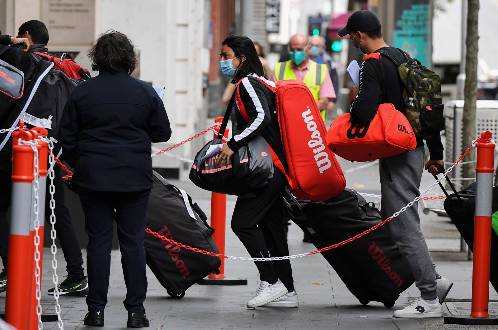 Tennis players, coaches and officials arrive at a hotel in Melbourne, Australia, Jan. 15, 2021. (AFP PHOTO) 