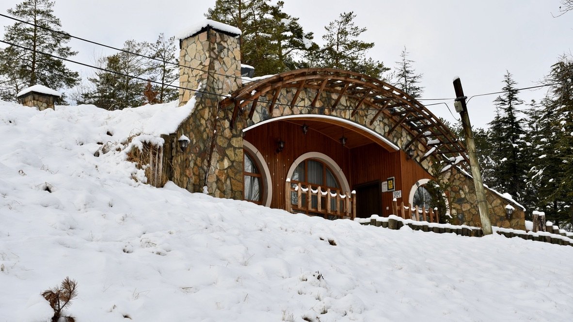 The hobbit houses enchanted visitors and fantasy enthusiasts as it was blanketed by milky-white snow in Sivas, central Turkey, Jan. 14, 2021. (AA Photo)