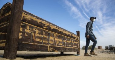 An adorned wooden sarcophagus is displayed during the official announcement of the discovery at Egypt's Saqqara necropolis, south of Cairo, Jan. 17, 2021. (AFP Photo)