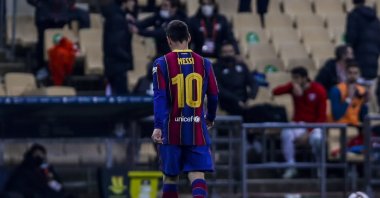 Barcelona's Lionel Messi walks out of the pitch after being sent off during the Spanish Super Cup final against Athletic Bilbao at La Cartuja Stadium, Seville, Spain, Jan. 17, 2021. (AP Photo)