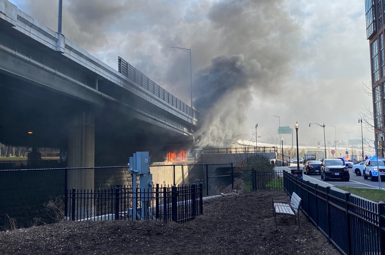 A fire burns under a bridge in Washington, D.C., U.S. on Jan. 18, 2021. (Edward Daniels via Reuters)
