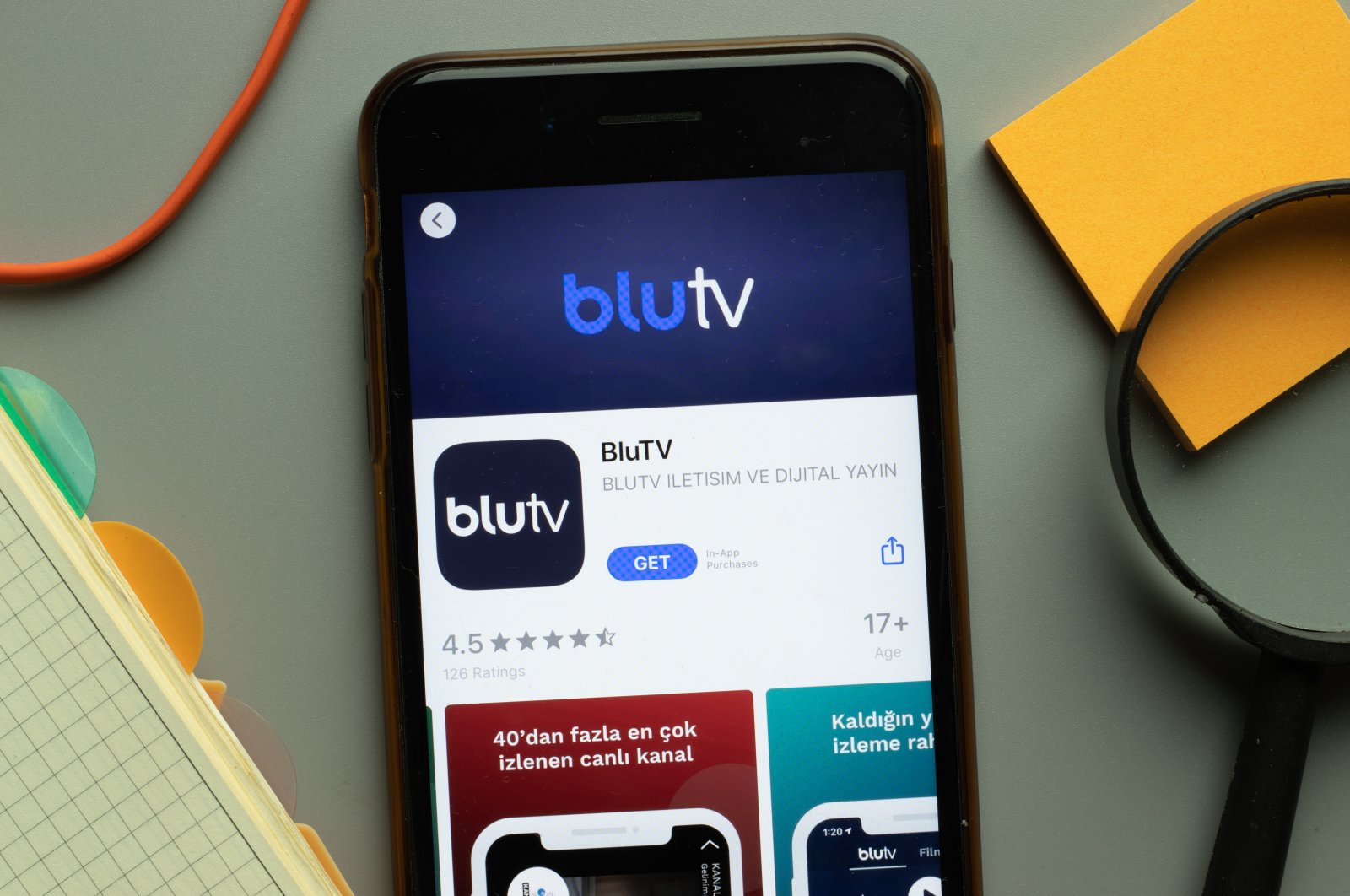 BluTV mobile app logo on a phone screen, in New York, Oct. 26, 2020.
