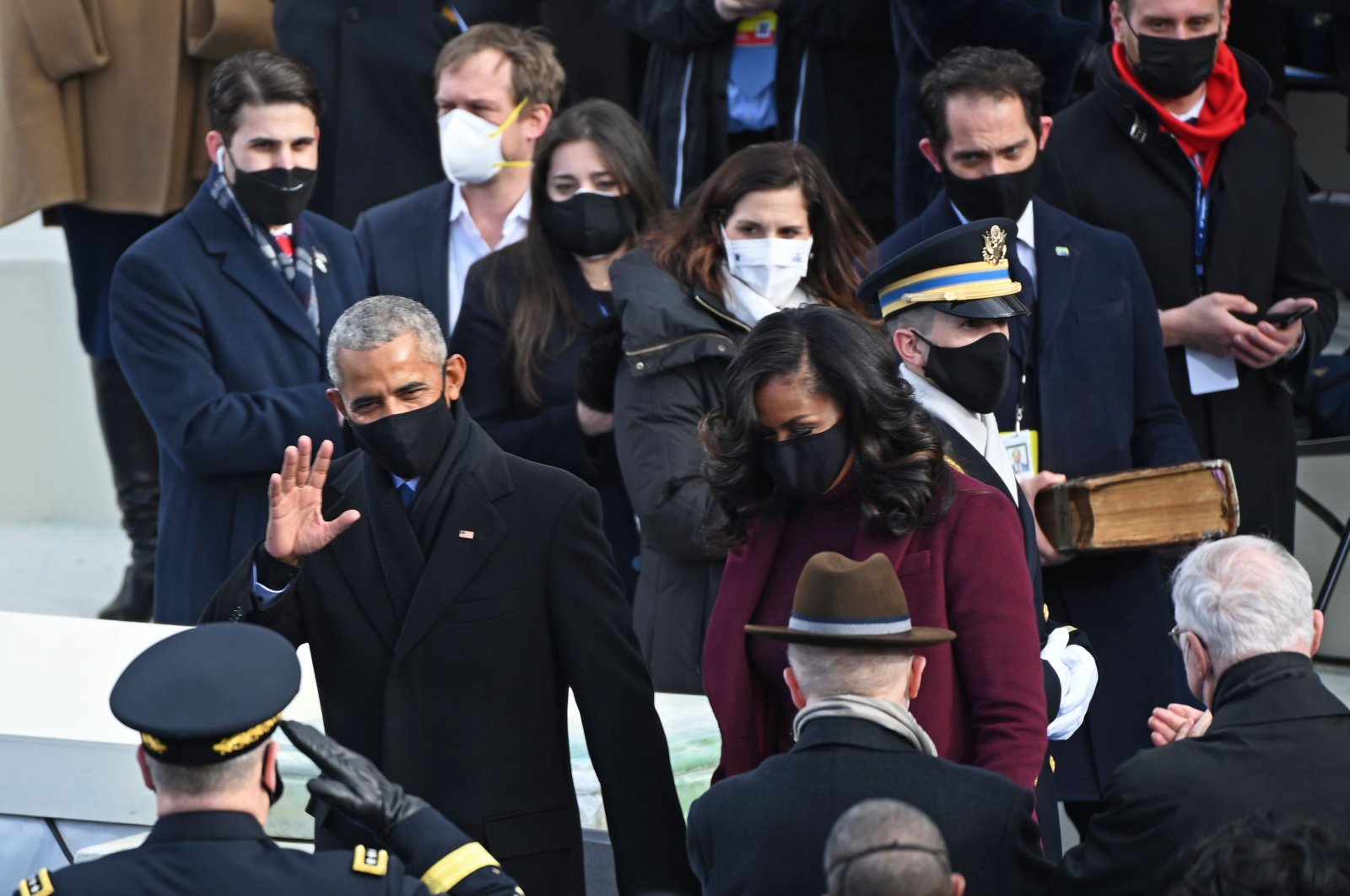 Former President Barack Obama and wife Michelle are greeted as they arrive on Capitol Hill before Joe Biden is sworn in as the 46th U.S. President, U.S. Capitol, Washington, DC, Jan. 20, 2021. (AFP Photo)