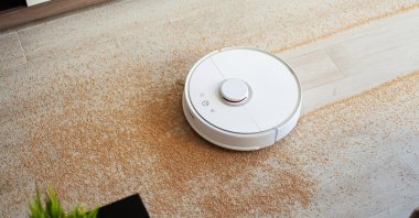Robot vacuums are perfect for picking up crumbs and sweeping up dust on a daily basis but may not be the best for a deeper clean. (Shutterstock Photo)