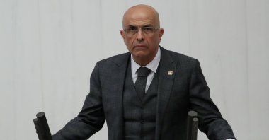Enis Berberoğlu, a deputy from the main opposition Republican People's Party (CHP), takes his oath at the Turkish Parliament in the capital Ankara, Turkey, Oct. 1, 2018. (Reuters Photo)