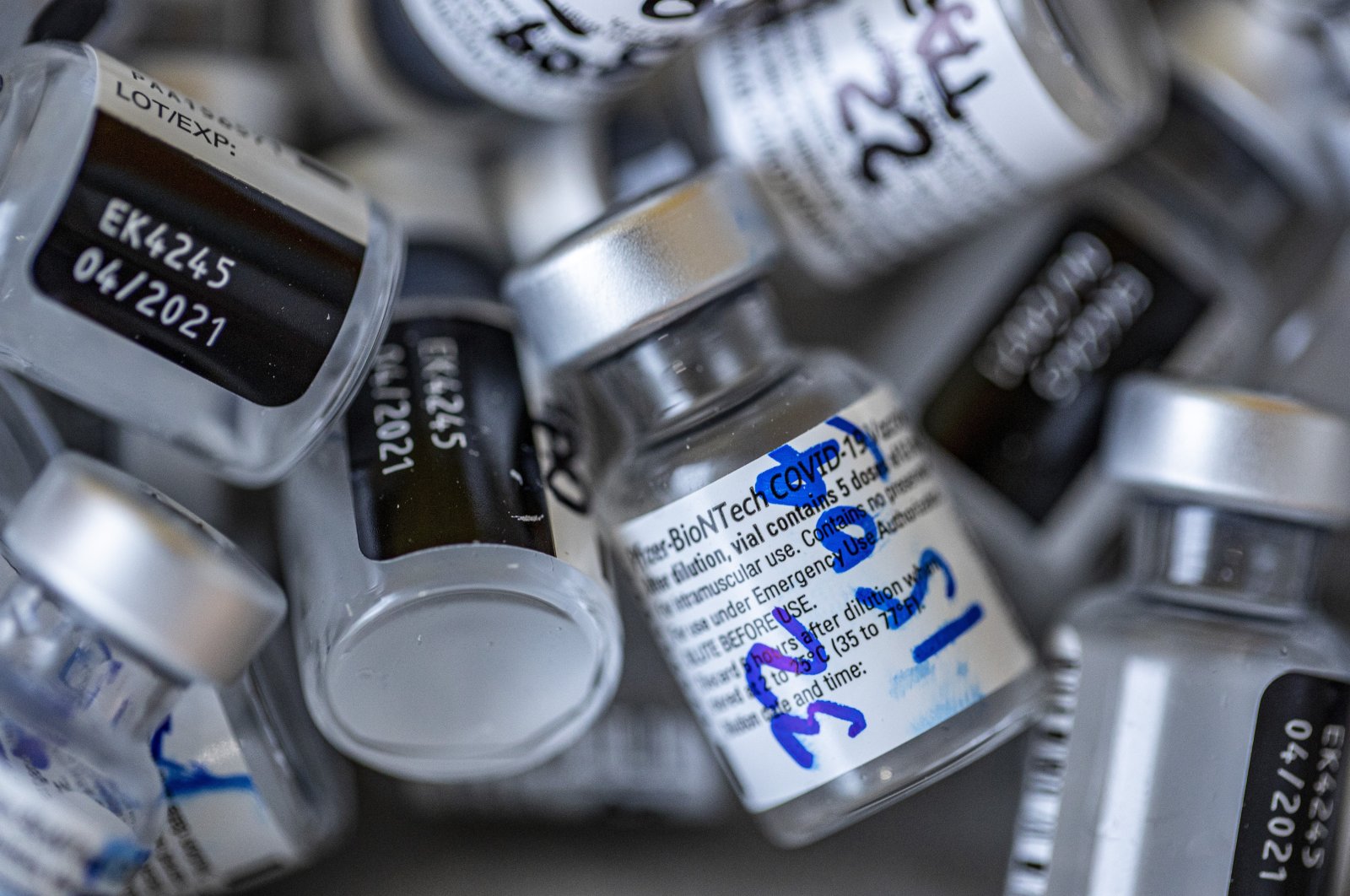 Empty vials that contained the Pfizer-BioNTech COVID-19 vaccine sit in a pile at the Posta Central Hospital in Santiago, Chile, Jan. 13, 2021. (AP Photo)
