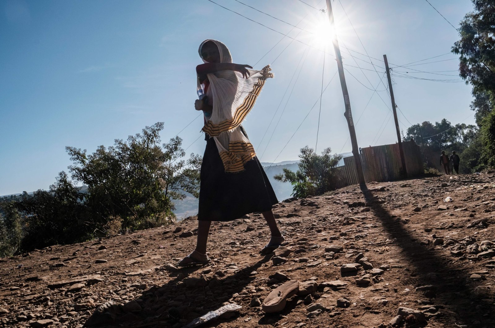 A girl walks in a street in Gondar, Ethiopia, on Jan. 20, 2021. (AFP Photo)
