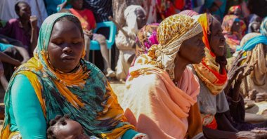 Sudanese internally displaced people stage a sit in to protest against the end of the mandate of the United Nations and African Union peacekeeping mission (UNAMID), in Kalma camp in Nyala, the capital of South Darfur, Sudan, Dec. 31, 2020. (AFP Photo)