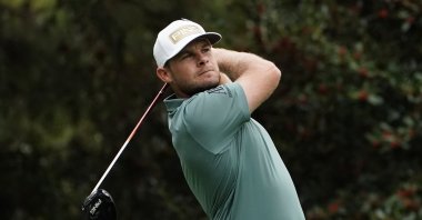 England's Tyrrell Hatton overcame Rory McIlroy's one-shot advantage and a double lead to win the Abu Dhabi Championship final in Abu Dhabi, the United Arab Emirates (UAE), Jan. 24, 2021.