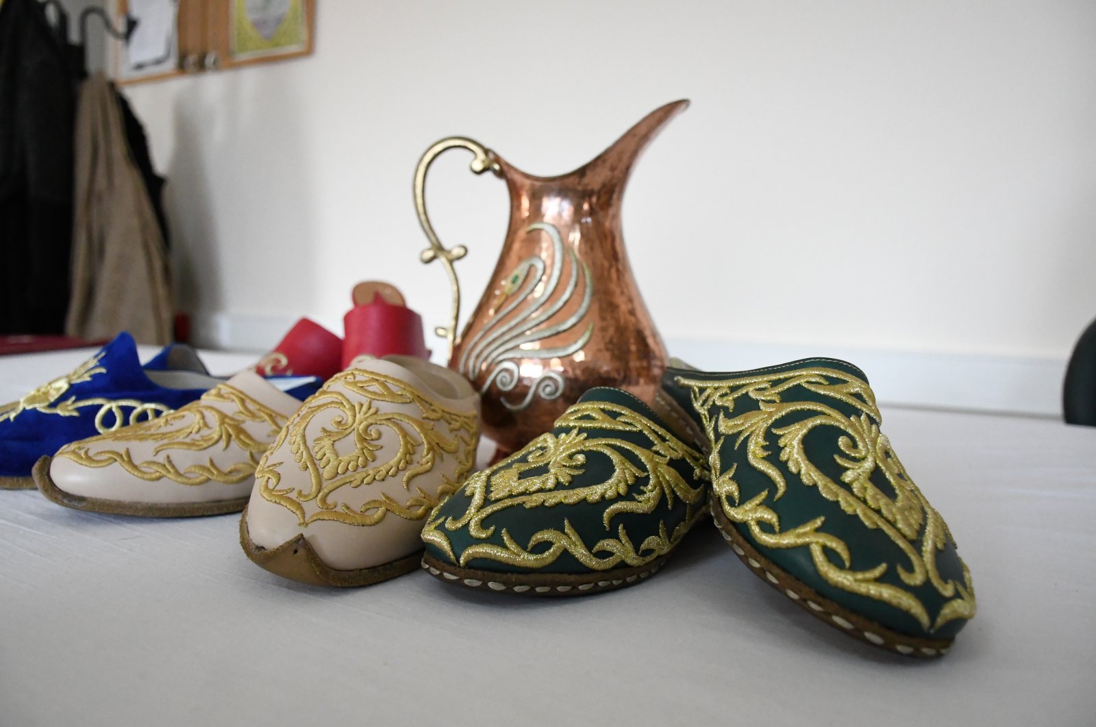 Slippers and a pitcher decorated with sim sırma at Kahramanmaraş Technical Institute, southern Turkey, Jan. 21, 2021. (AA Photo)