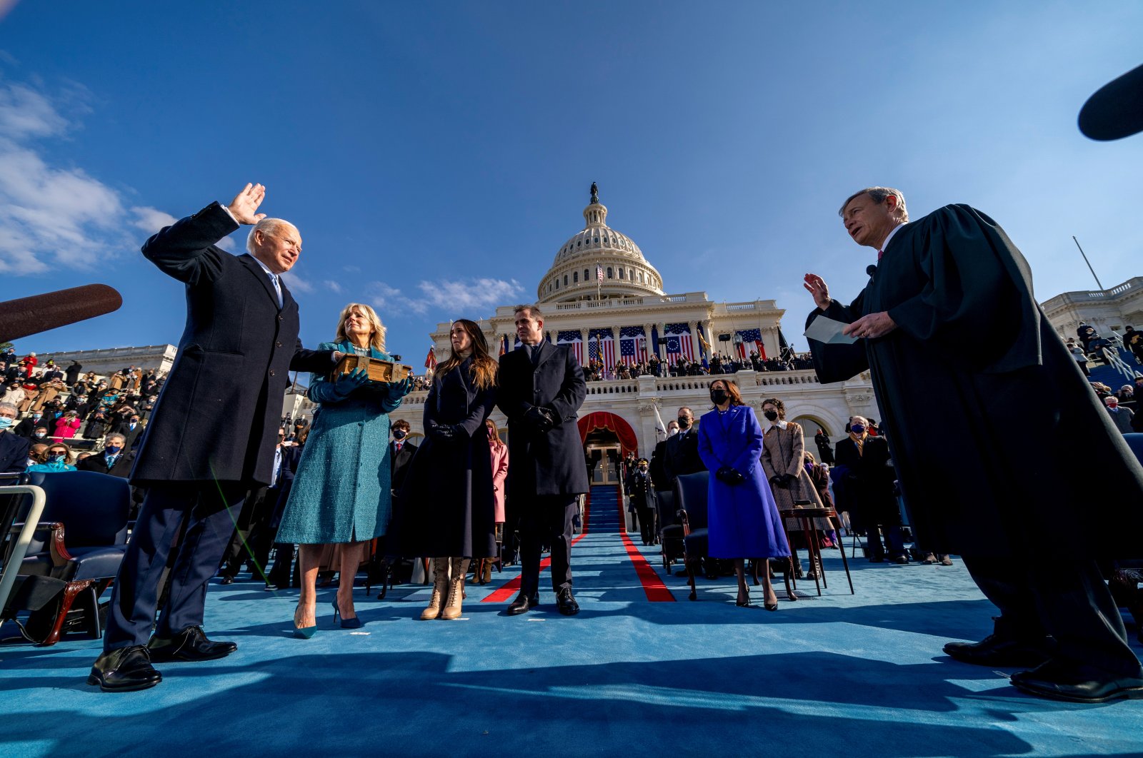 Joe Biden is sworn in as the 46th president of the United States as Jill Biden holds the Bible during the inauguration at the U.S. Capitol, Washington, D.C., the U.S., Jan. 20, 2021. (Reuters Photo)