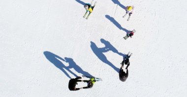 Kids receive skiing lessons from instructors at Palandöken Ski resort in Erzurum, eastern Turkey. (AA Photo)