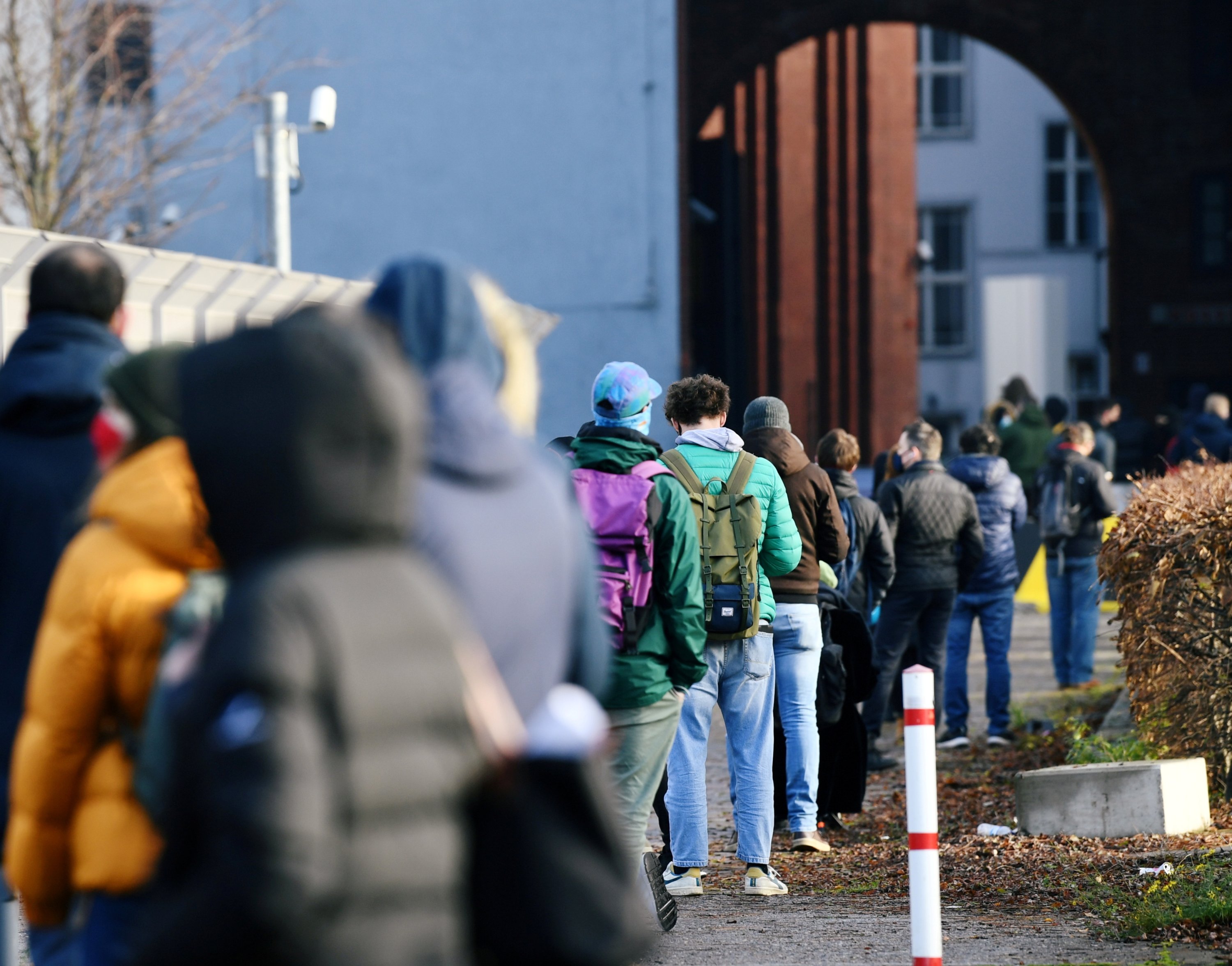 People queue at a walk-in COVID-19 testing center at Wilhelmstrasse, amid the COVID-19 pandemic, in Berlin, Germany, Dec. 18, 2020. (REUTERS Photo)