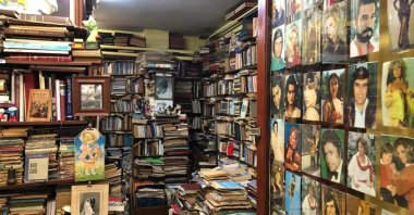 Upon entrance, photographed portraits of Turkish celebrities call for immediate attention at Rengin Sahaf in Istanbul's Kadıköy district, Turkey. (Photo by Matt Hanson)