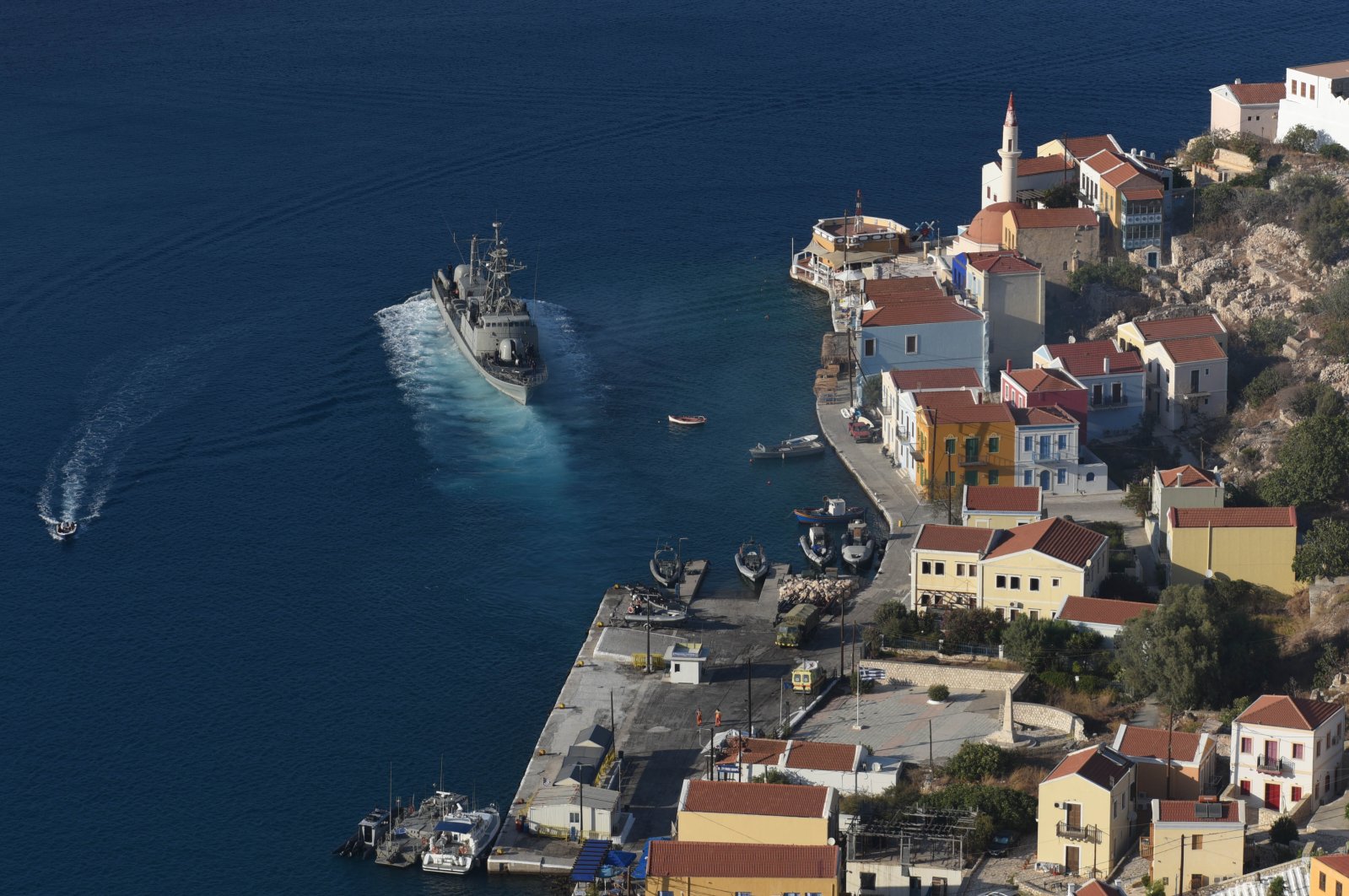 A Greek navy warship leaves the island of Kastellorizo (Megisti-Meis) off Turkey's southern coast, Kastellorizo, in the Dodecanese, Greece, Sept. 8, 2020. (AP Photo)