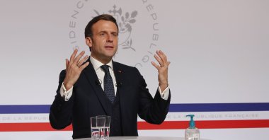 French President Emmanuel Macron attends a videoconference at the Elysee Palace in Paris, France, Jan. 26, 2021. (AP Photo)