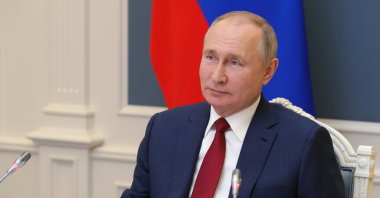 Russian President Vladimir Putin speaks to participants of the World Economic Forum via video in Moscow, Russia, Wednesday, Jan. 27, 2021. (AP Photo)