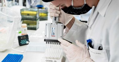Researchers at Aalborg University screen and analyze positive coronavirus samples for the virus variant cluster B117 from the United Kingdom, in Aalborg, Denmark, Jan. 15, 2021. (AFP Photo)