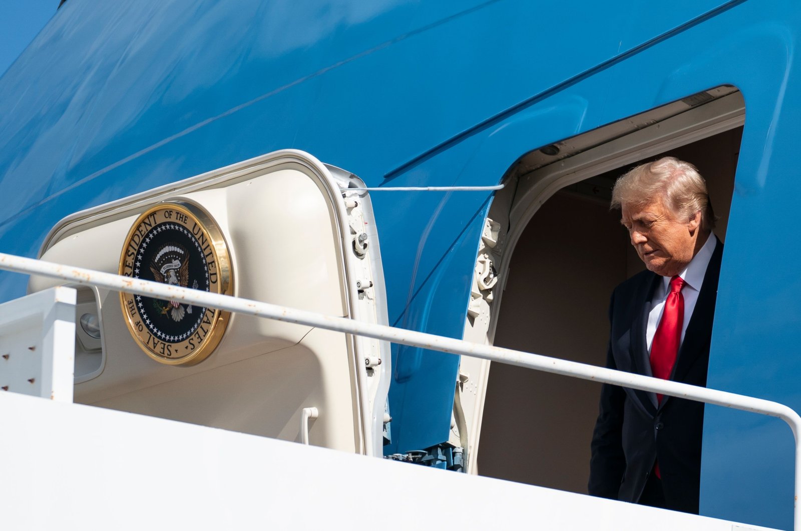 Outgoing U.S. President Donald Trump exits Air Force One after arriving at Palm Beach International Airport in West Palm Beach, Florida, U.S., Jan. 20, 2021. (AFP Photo)