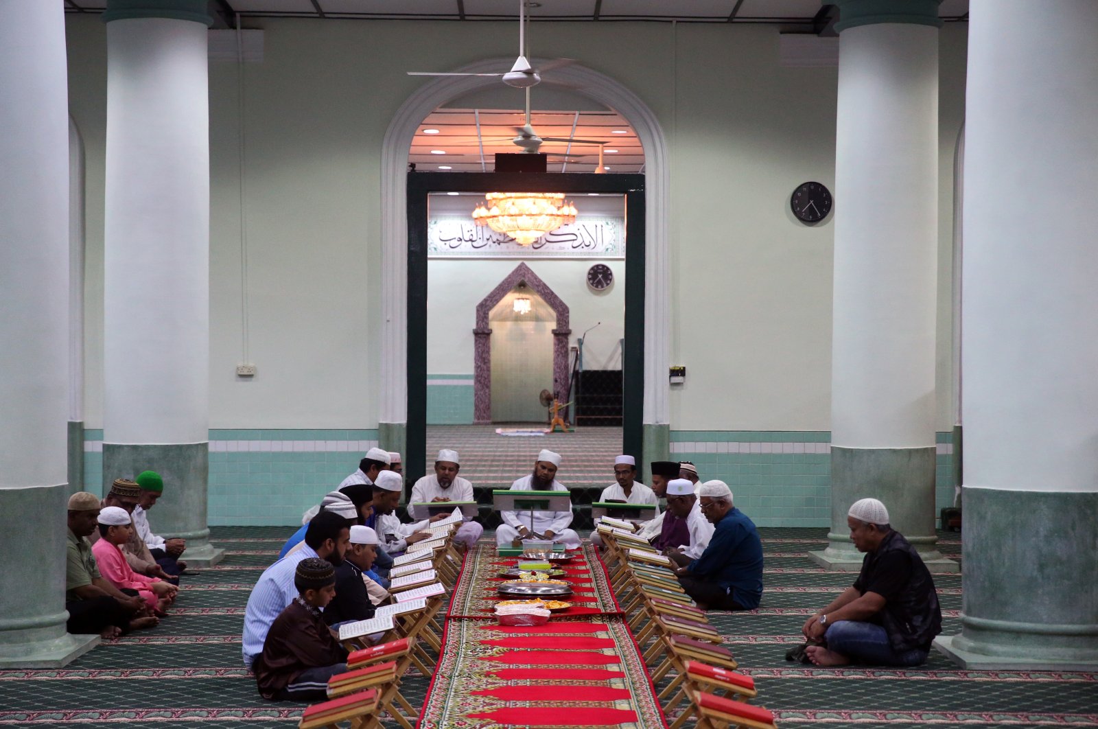 Muslims studying the Quran in Masjid Jamae, one of the earliest mosques in Singapore located in Chinatown, Feb. 25, 2017. (Shutterstock Photo)