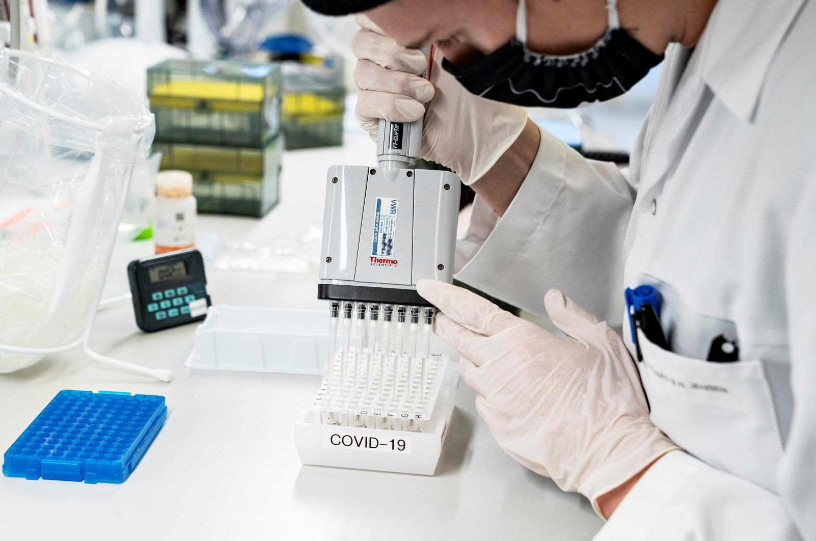 Researchers at Aalborg University screen and analyze positive coronavirus samples for the virus variant cluster B117 from the United Kingdom, in Aalborg, Denmark, Jan. 15, 2021. (AFP Photo)