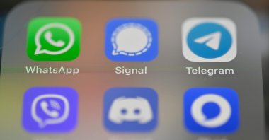 A smartphone screen displays the icons for messaging service applications WhatsApp, Signal, Telegram, Viber, Discord and Olvid in Rennes, western France, Jan. 22, 2021. (AFP Photo)