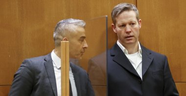 Main defendant Stephan Ernst (R), talks to his lawyer Mustafa Kaplan (L), in the courtroom at the higher regional court in Frankfurt, Germany, Jan. 28, 2021. (AP Photo)