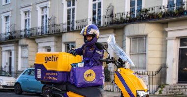 A Getir delivery person is seen beside his bike, London, U.K., Jan. 27, 2021. (Courtesy of Getir)