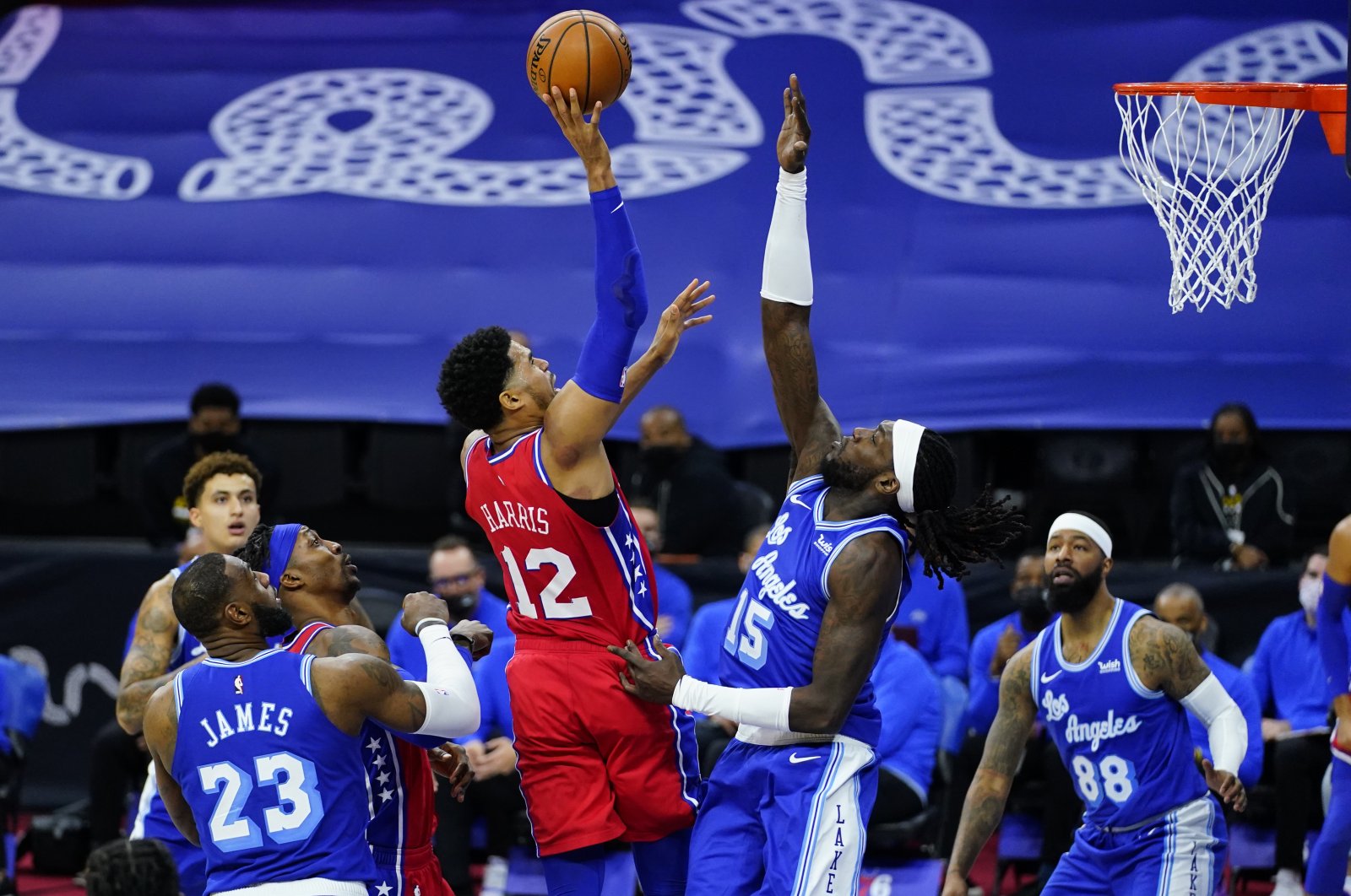 Philadelphia 76ers' power forward Tobias Harris (C) shoots against Los Angeles Lakers in an NBA game, Philadelphia, U.S. Jan. 27, 2021. (AP Photo)