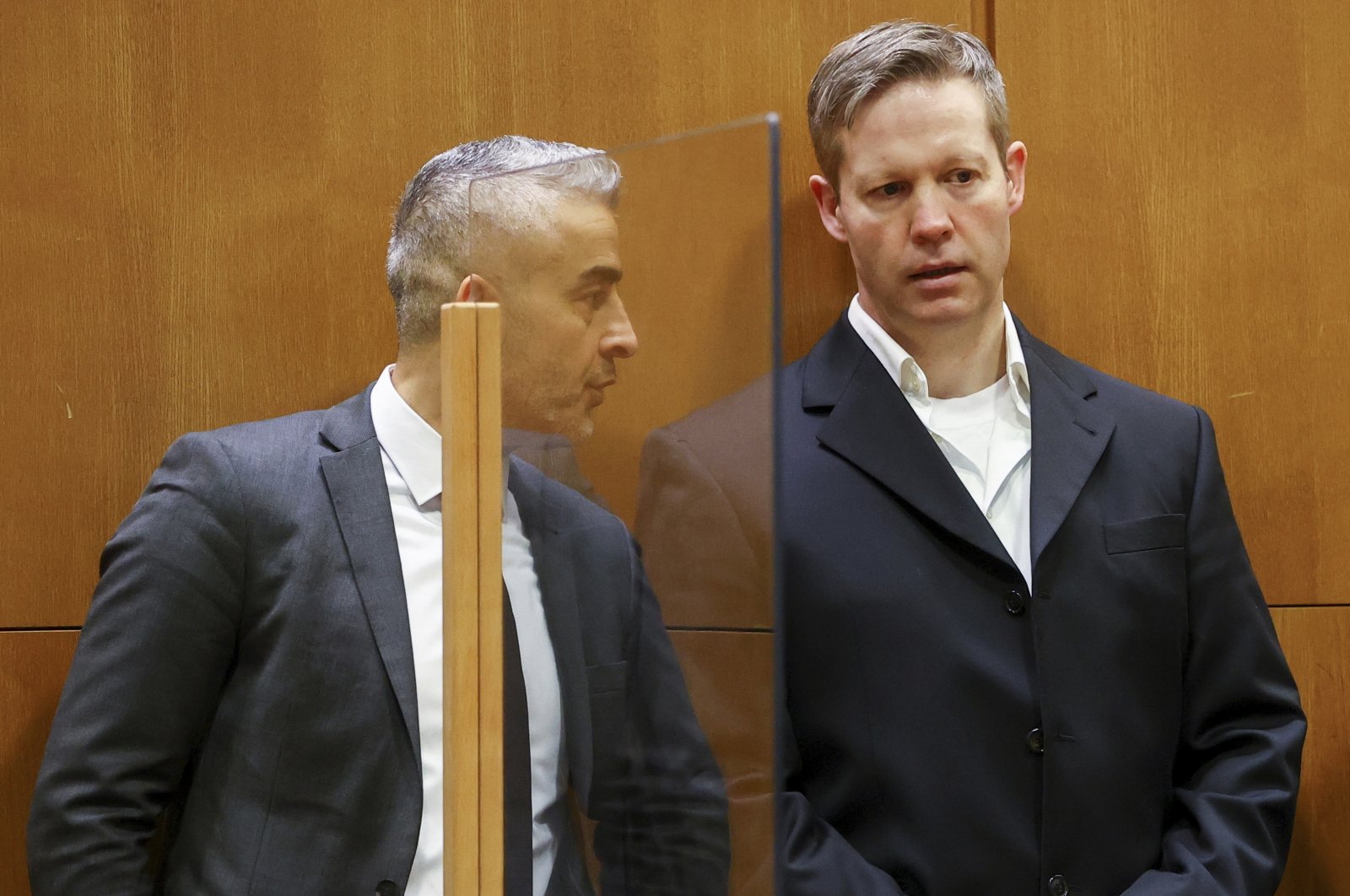 Main defendant Stephan Ernst (R), talks to his lawyer Mustafa Kaplan (L), in the courtroom at the higher regional court in Frankfurt, Germany, Jan. 28, 2021. (AP Photo)
