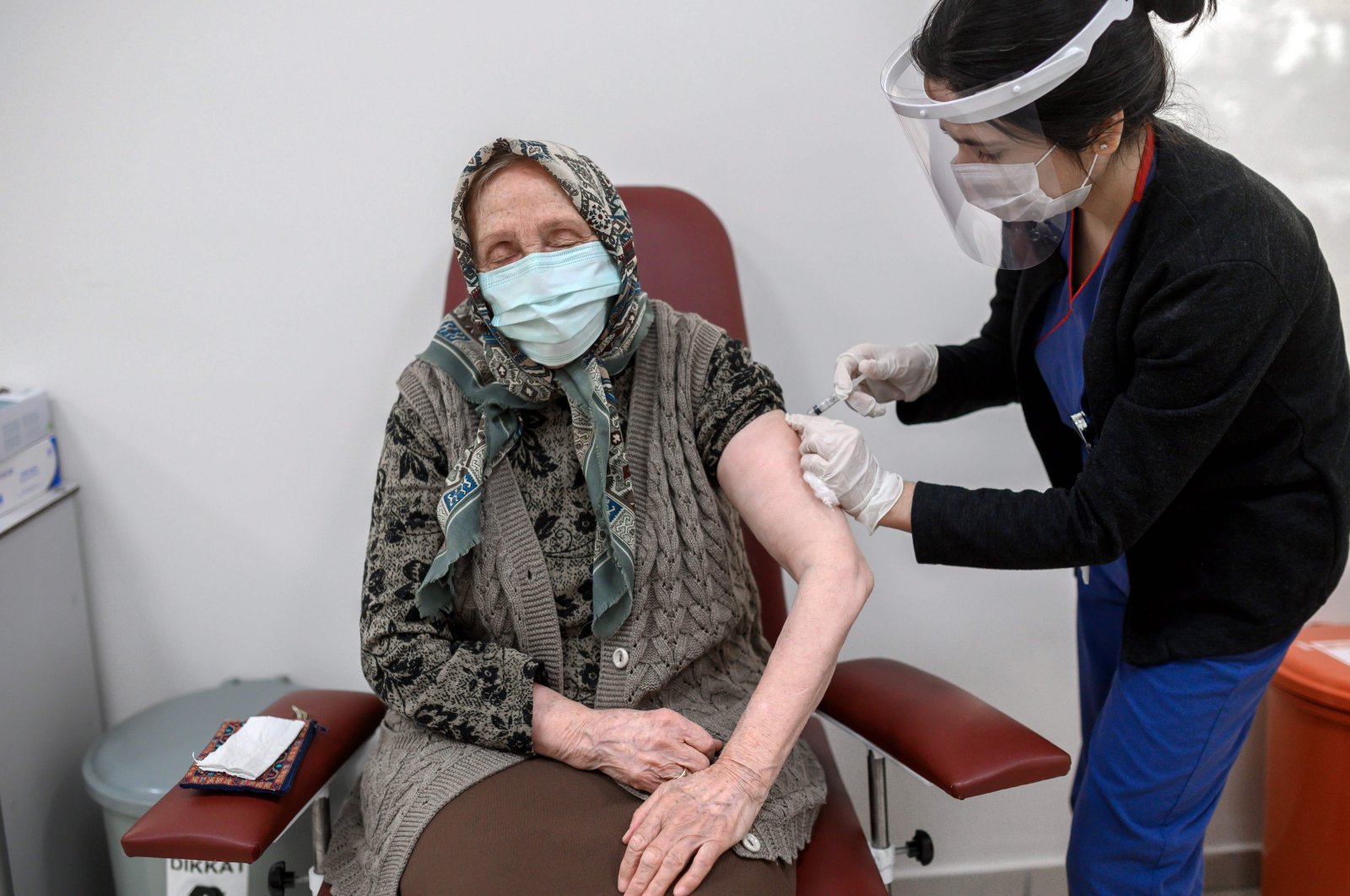 A woman receives an injection of the CoronaVac COVID-19 vaccine at a hospital in Istanbul, Turkey, Jan. 28, 2021 (AFP Photo)