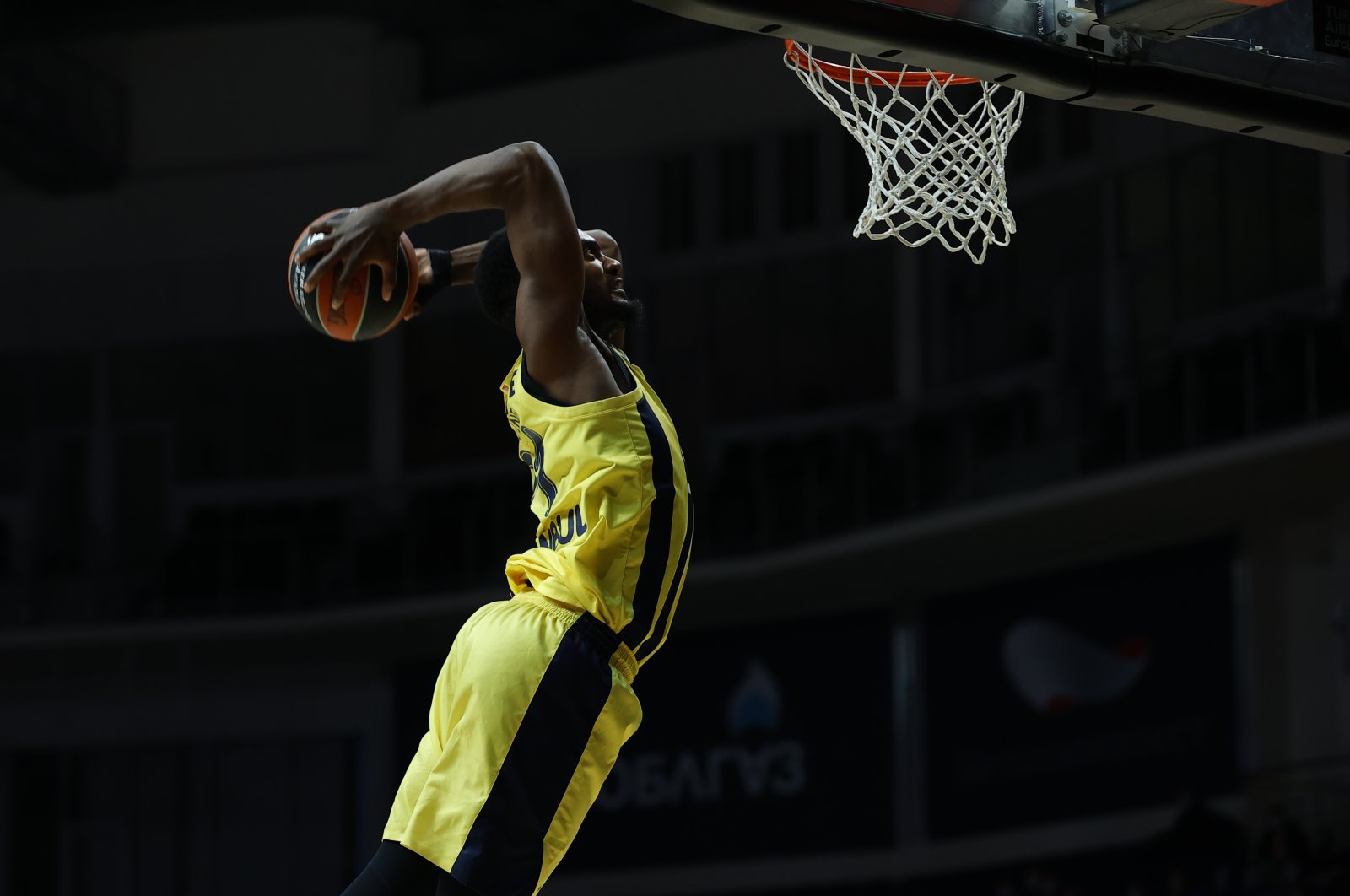 Fenerbahçe Beko's Dyshawn Pierre jumps for a slam dunk at Moscow's Mytishchi Arena, Russia on Jan. 28, 2021 (AA Photo)