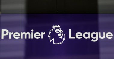 The Premier League logo is pictured through a glass window at the league's headquarters in London, Britain, March 13, 2020. (AFP Photo)