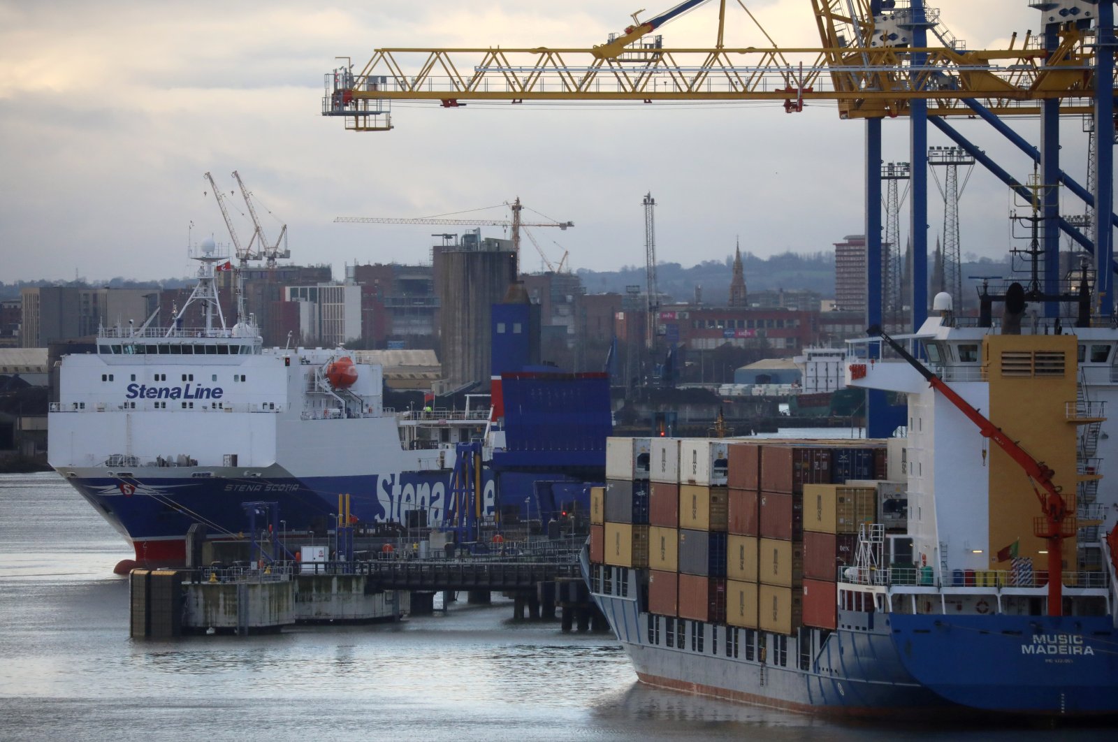 A Stena Line Irish Sea ferry docks next to a container ship at the Port of Belfast, Northern Ireland, Jan. 2, 2021. (Reuters Photo)