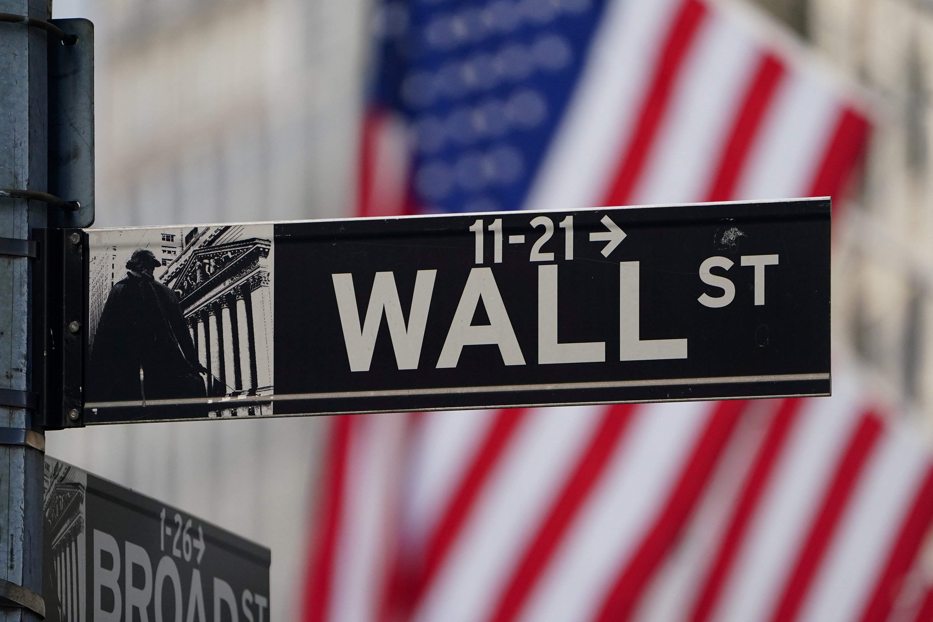 The Wall Street sign is pictured at the New York Stock Exchange (NYSE) in the Manhattan borough of New York City, U.S., March 9, 2020. (Reuters Photo)
