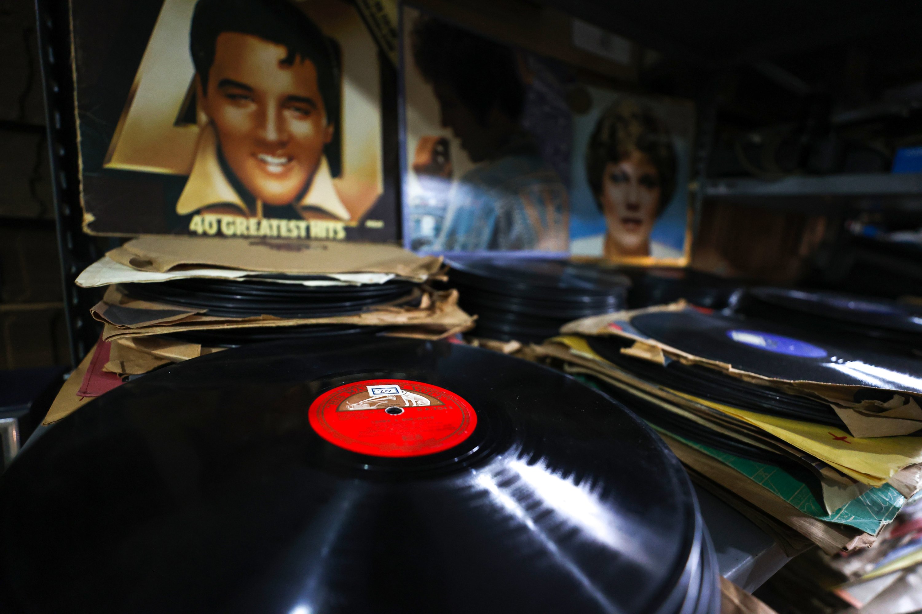 Some vinyl records on display with famous singer Elvis Presley
