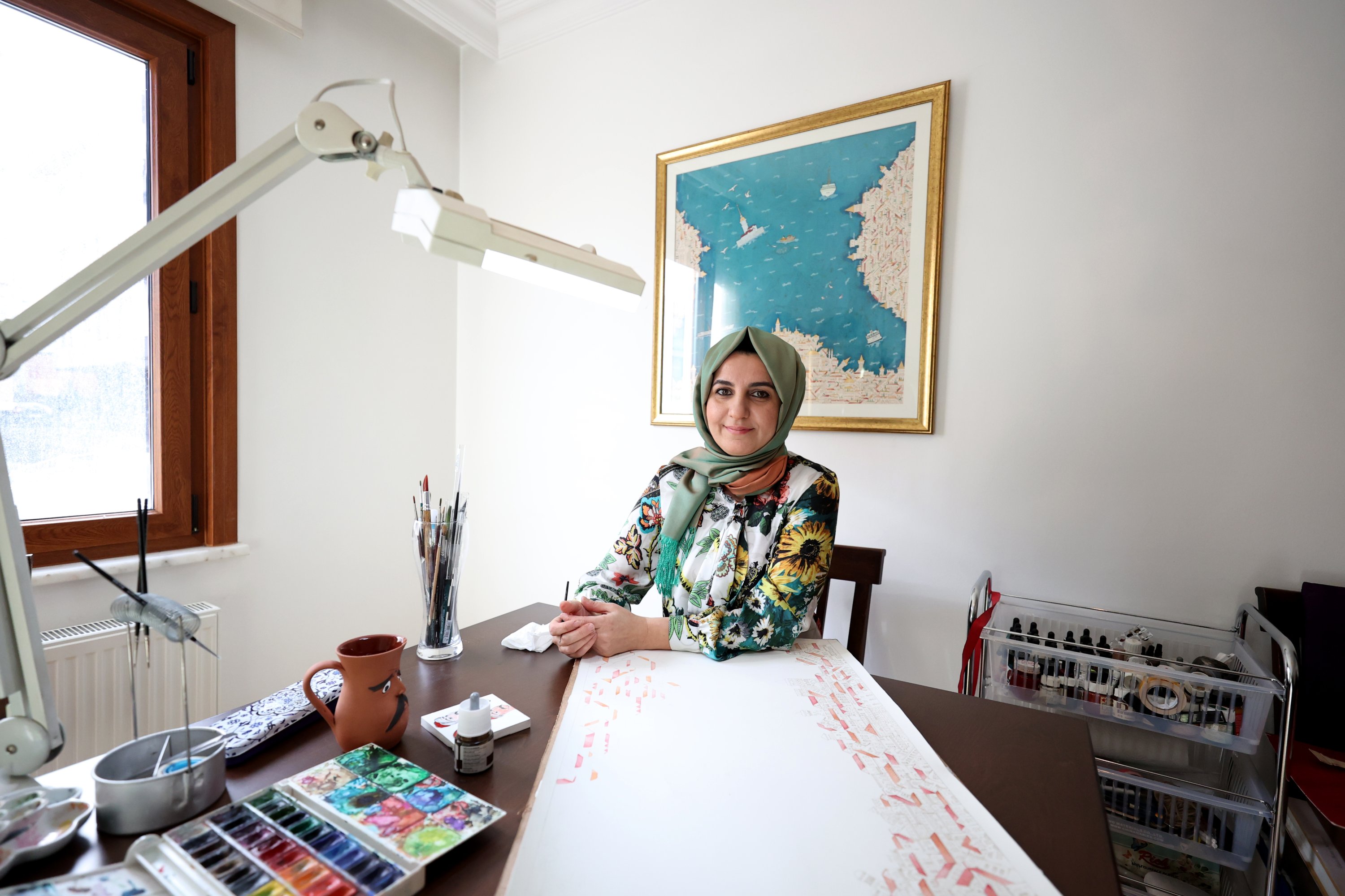 Ayşe Yıldrım poses at her workshop in Istanbul, Turkey, Jan. 31, 2020. (AA Photo)
