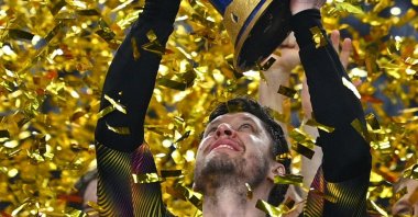 Denmark's goalkeeper Niklas Landin Jacobsen lifts the trophy after the 2021 World Men's Handball Championship final against Sweden at the Cairo Stadium Sports Hall, Cairo, Egypt, Jan. 31, 2021. (AFP Photo)