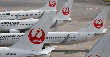 Japan Airlines (JAL) airplanes are seen, amid the coronavirus disease (COVID-19) outbreak, at the Tokyo International Airport, commonly known as Haneda Airport in Tokyo, Japan, Oct., 30, 2020. (Reuters Photo)