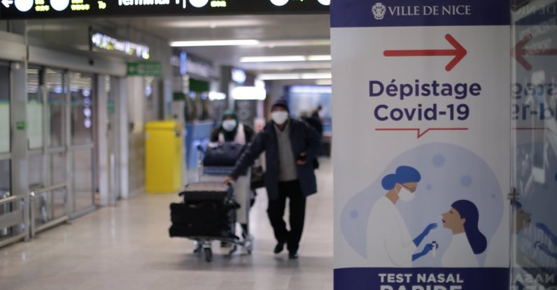 A sign showing the way to the coronavirus testing center at the Nice international airport as France closed its borders to travelers outside of the European Union due to restrictions against the spread of COVID-19, France, Feb. 1, 2021. (Reuters Photo)