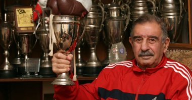 Garbis Zakaryan holds one his trophies. (Archive Photo)