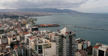 A view from downtown Izmir of the Karaburun peninsula in the background, which was the closest to the epicenter of two earthquakes in the Aegean, in western Turkey, Feb. 1, 2021. (AA Photo)