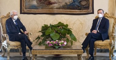 This handout picture taken and released by the Quirinal press office shows former Italian head of the European Central Bank Mario Draghi (R) and Italian President Sergio Mattarella in a meeting, at the Quirinal Palace, in Rome, Italy, Feb. 3, 2021. (AFP Photo)