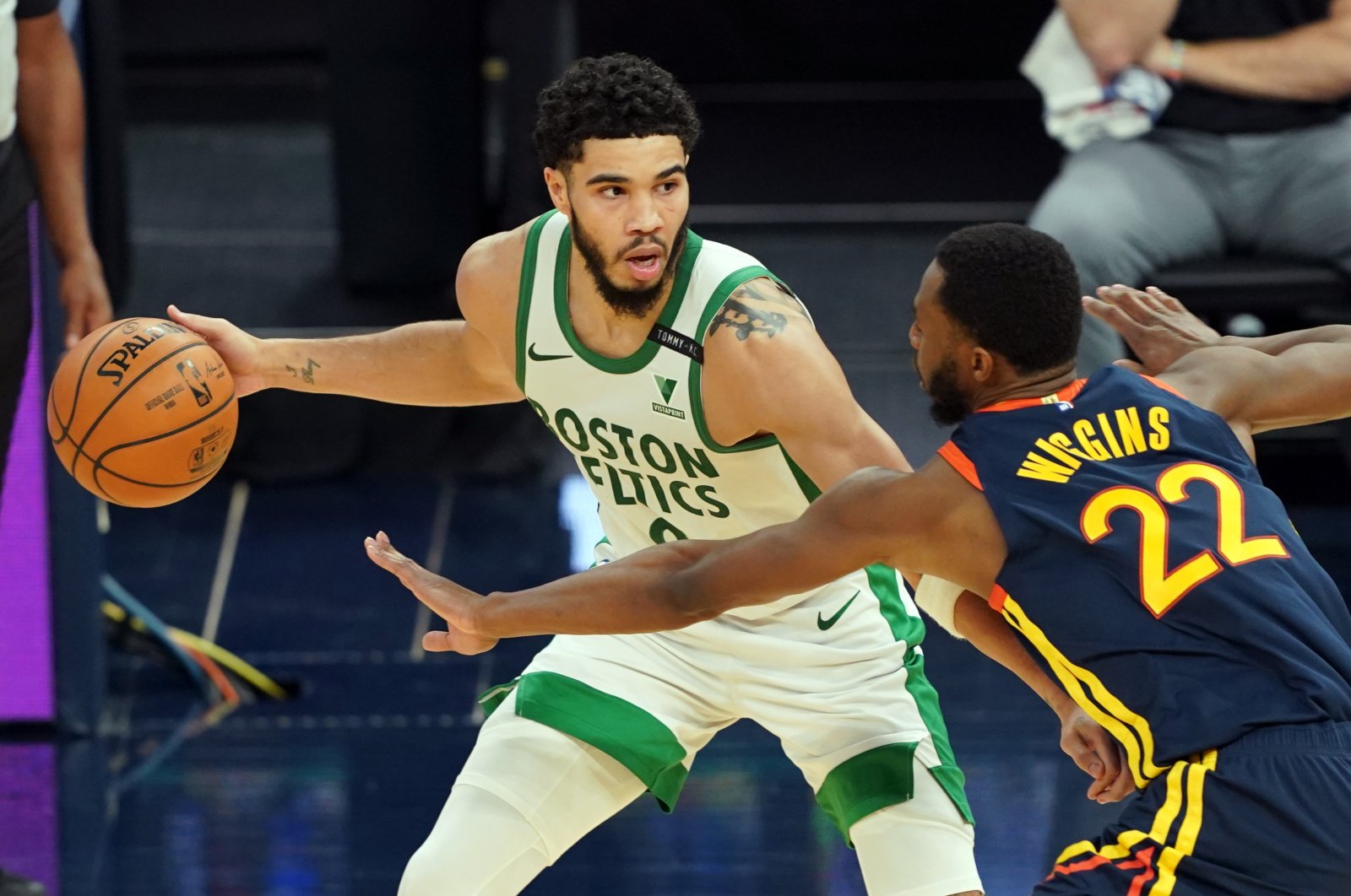 Boston Celtics forward Jayson Tatum (L) handles the ball while being defended by Golden State Warriors forward Andrew Wiggins (R) during the third quarter at Chase Center, San Francisco, California, U.S., Feb. 2, 2021. (Reuters Photo)