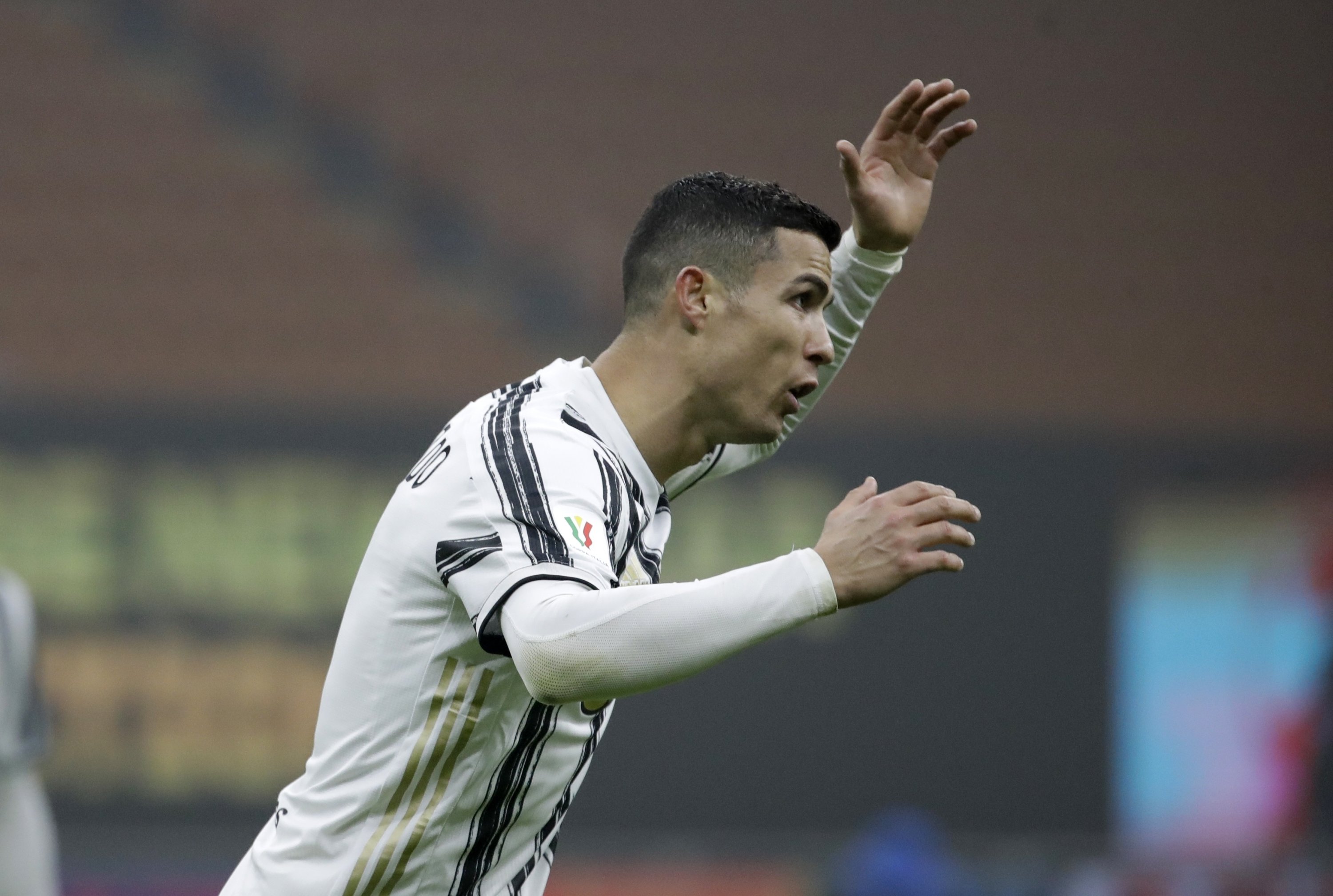 Juventus' Cristiano Ronaldo argues with the referee during the Italian Cup semifinal against Inter Milan at the San Siro, Milan, Italy, Feb. 2, 2021. (AP Photo)
