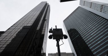 Security cameras scan the area in front of Trump Tower, New York, U.S., Feb. 3, 2021. (AP Photo) 

