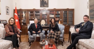 Beyhan Bağış (L), her husband Egemen Bağış (C-L), Turkey's ambassador to Prague,  receive Czech artist Victoria Velvet (C-R) and her husband Thomas David Blyth (R) at the Turkish embassy in Prague, Czech Republic, Jan. 9, 2021 (AA Photo)
