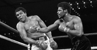 In this Feb. 15, 1978, file photo, Leon Spinks (R) connects with a right hook to Muhammad Ali, during the late rounds of their championship fight in Las Vegas. (AP Photo)